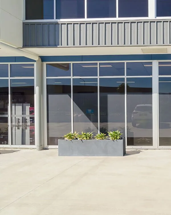 Milano Concrete Planter Box in Multi Span Parking Area