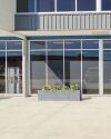 Milano Concrete Planter Box in Multi Span Parking Area