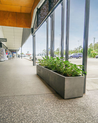 Pitted Trough Planters livening up a public walkway