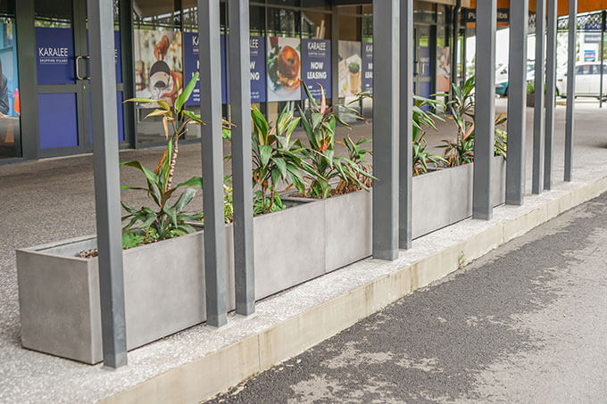 Custom Concrete Planters Line Shopping Centre Walkway And Add Colour