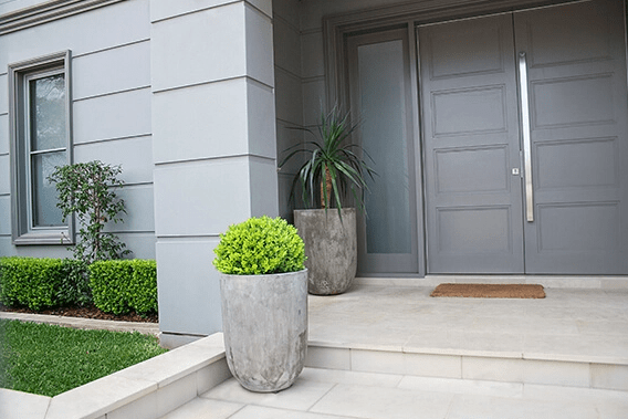 Enhancing a limited space on doorways using planters