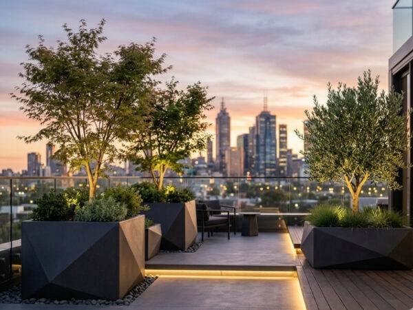 Large fibreglass planters secured on a high-rise rooftop garden.