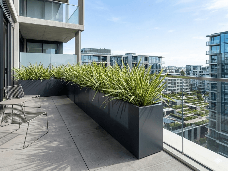 The Architect’s Blueprint: Specifying Fibreglass Planters for High-Performance Interiors and Podium Landscapes