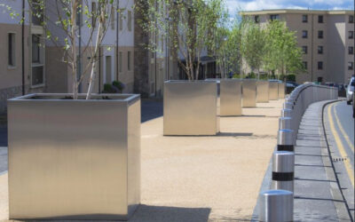 A Specifier’s Guide to Custom Planters: Steel, Wood, GRC, and Fibreglass Compared