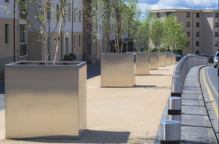 Custom Steel Planters for Trees Line a Pedestrian Walkway 
