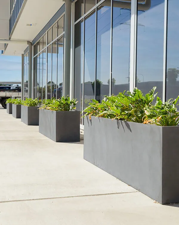 Milano Cement Planters infront of Multi Span Australia