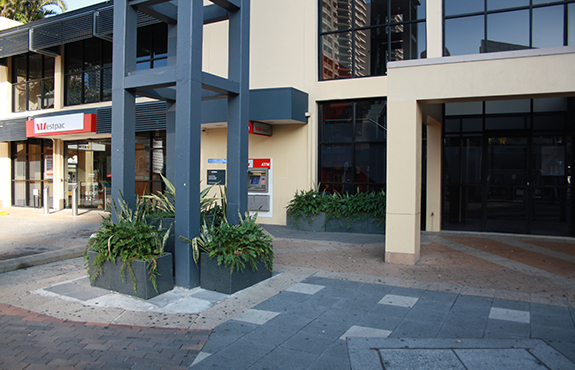 Granite trough planters in front of westpac