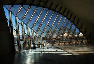 glass building with indoor planters