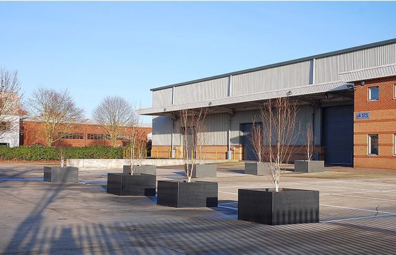 Lines of custom granite planters