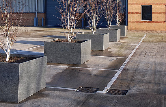 Custom granite planters at Milton Park