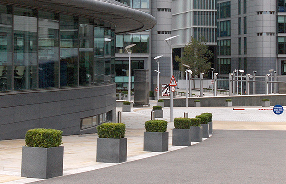 Lines of IOTA Granite Cube Planters at Paddington Central