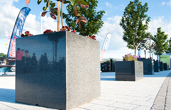 close up look of custom granite planters cube in derry