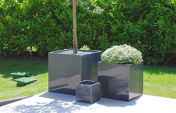 A cluster of cube planters of different sizes (600mm, 500mm and 250mm)